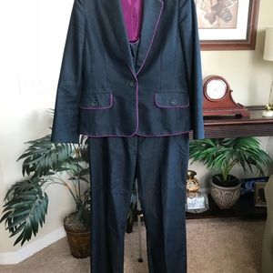 Dark blue suit with pink trimming-worn once.